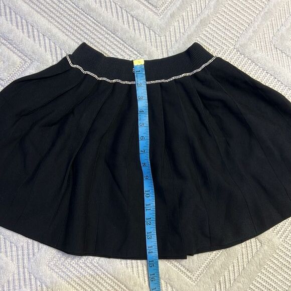 MAJE - PLEATED KNIT SHORT SKIRT - Picture 13 of 14